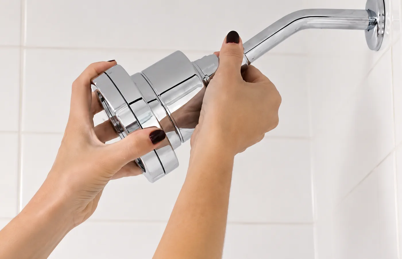 Hand replacing the showerhead filter